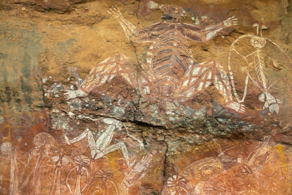 Darwin Visitor Guide. Rock art at Nanguluwurr or Nanguluwu (Nourlangie) in caves and shelters, Arnhem Land Escarpment, Kakadu National Park, Northern Territory, Australia