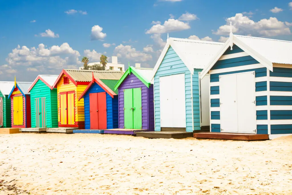 Planning a Trip to Melbourne. Beautiful Bathing houses on white sandy beach at Brighton in Melbourne, Australia