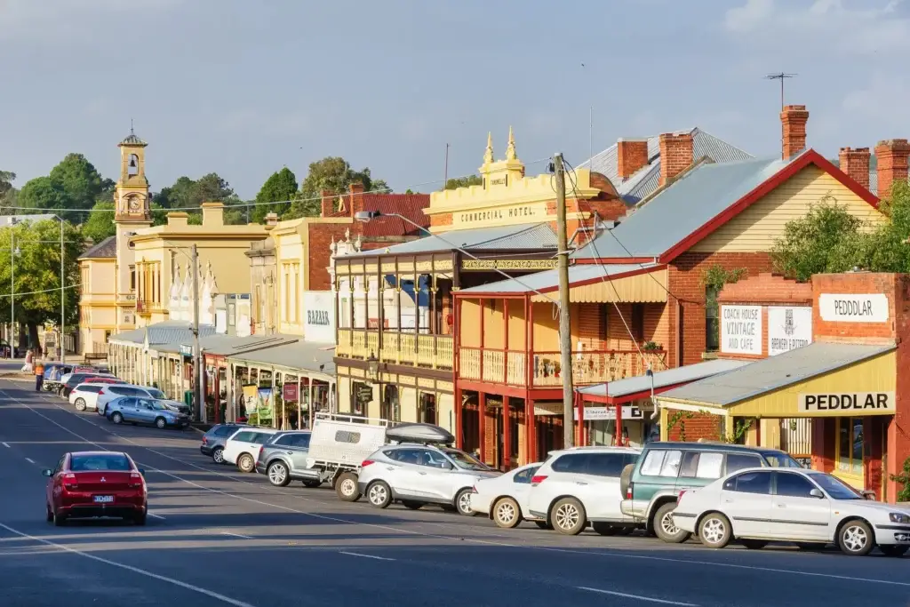 Main shopping strip lined with historic preserved buildings on Ford Street - Beechworth, Victoria, Australia