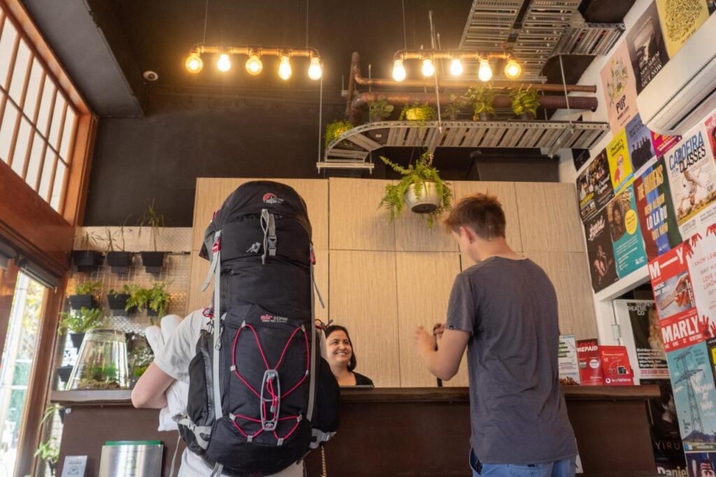 Guests being welcomed and checking-in at concierge at the Big Backpackers Hostel