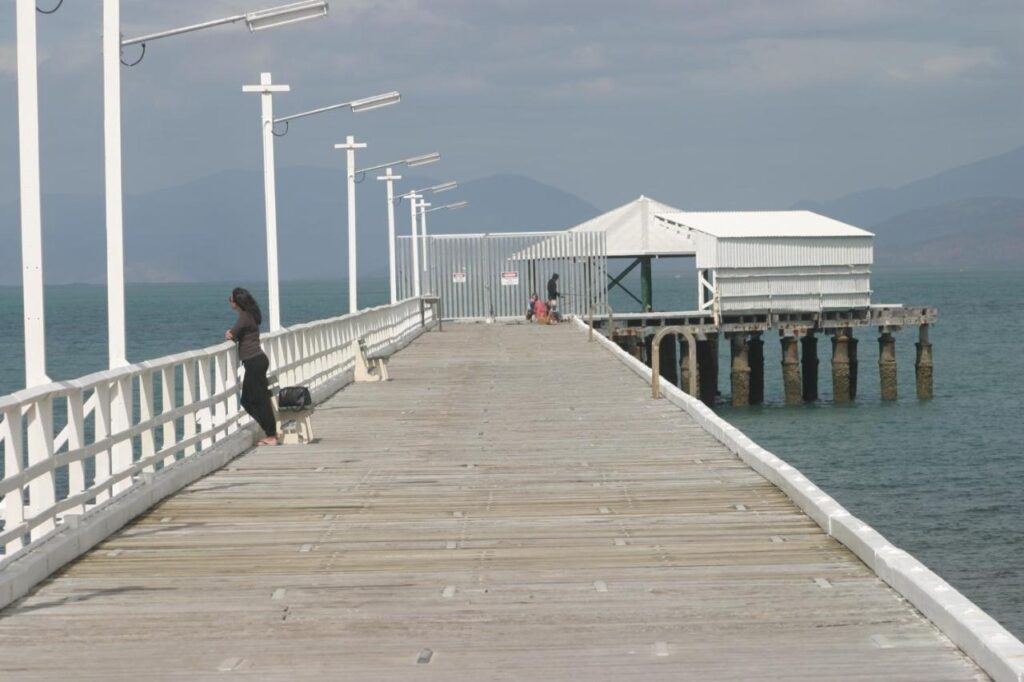 a traveller on the boardwalk on magnetic island, Queensland Australia, Cstay Guest House on Magnetic Island