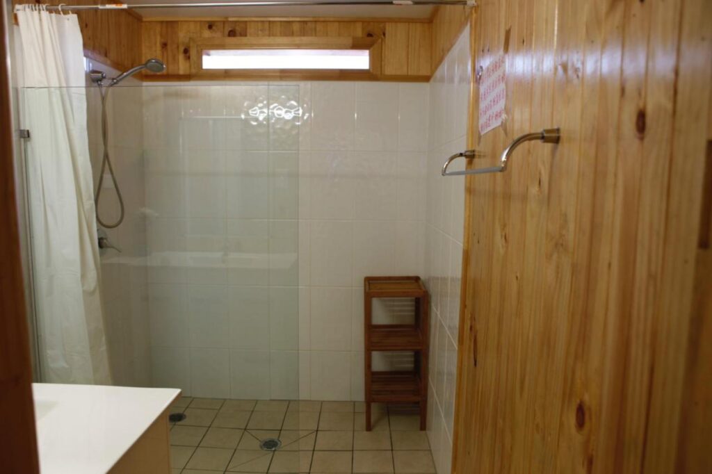 Clean fresh and modern bathrooms for a hot or cool shower at Happytourcairns Sharehouse