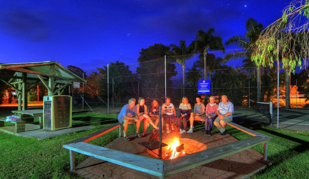 Guests connecting at the firepit and having a good chat under the stars at Mountain View Resort