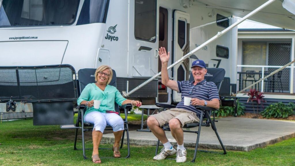 A couple of happy travellers enjoying their stay at Nobby Beach Holiday Village