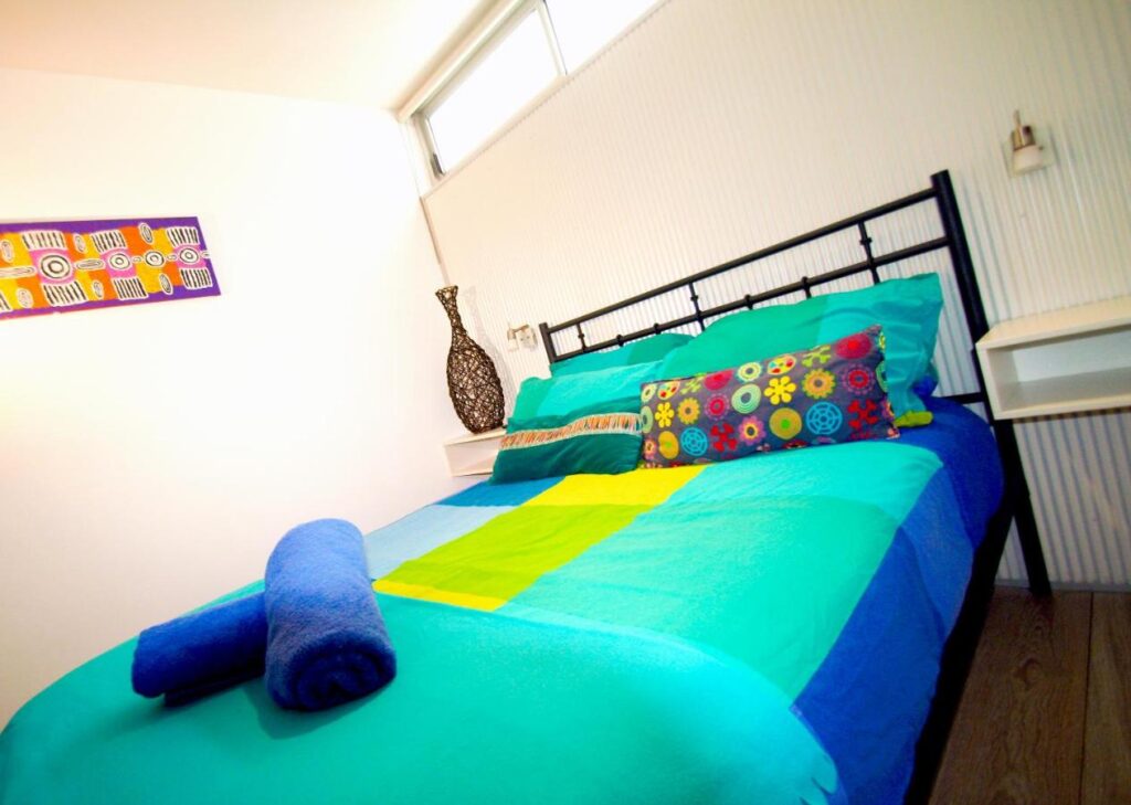 Bright and clean private rooms with fresh clean sheets at Original Backpackers