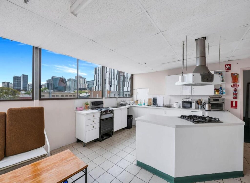 A kitchen with a great view of the city and local area while you cook your favourite foods at Studio 26 Wright Lodge