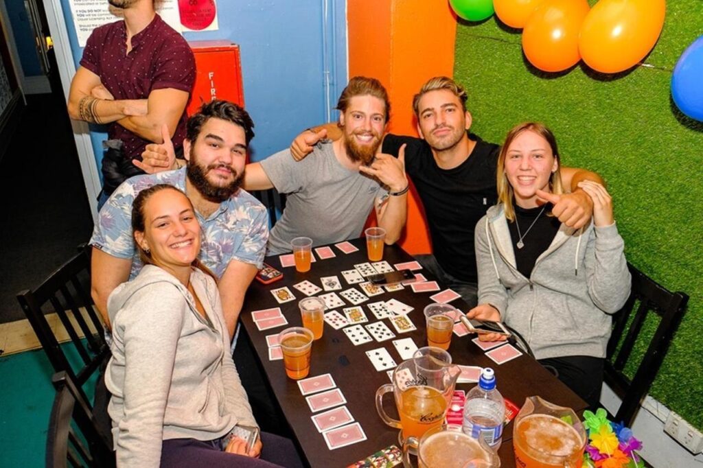 friendly travellers being social and enjoying themselves at Tequila Sunrise Hostel Adelaide