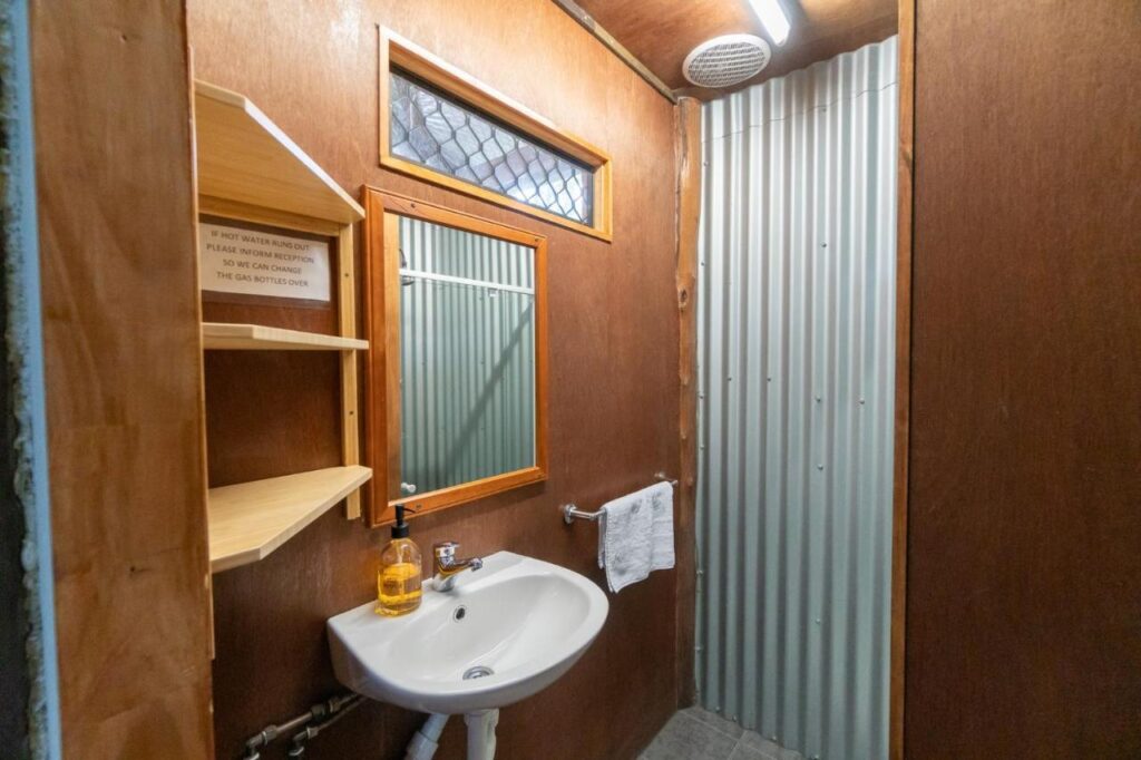 Private bathroom for guests at Woolshed Eco Lodge