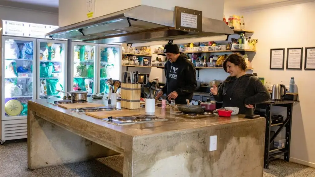 Kitchen where travellers and guests are cooking breakfast, lunch or dinner at Woopi Backpackers