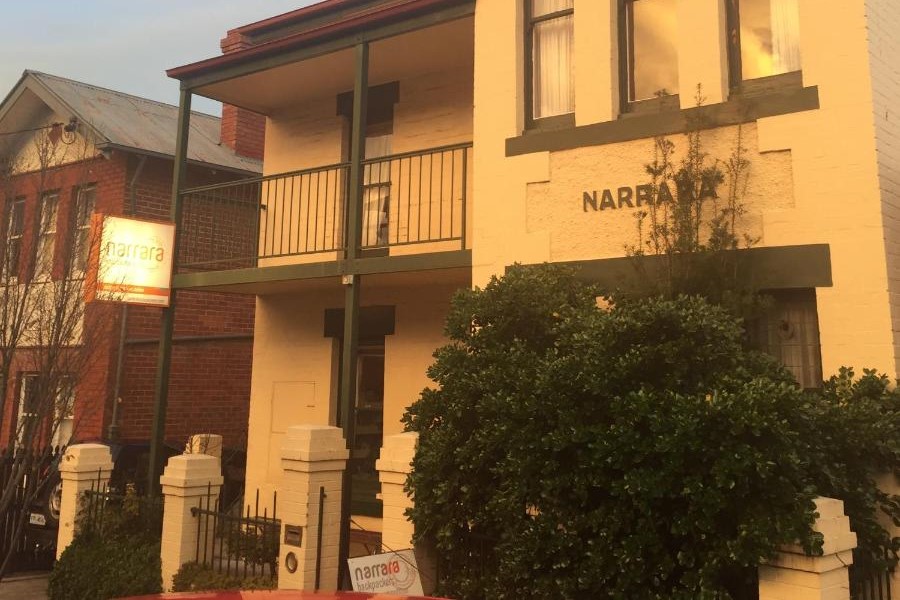 A street view of the location catching the beautiful afternoon sunset at Narrara Backpackers