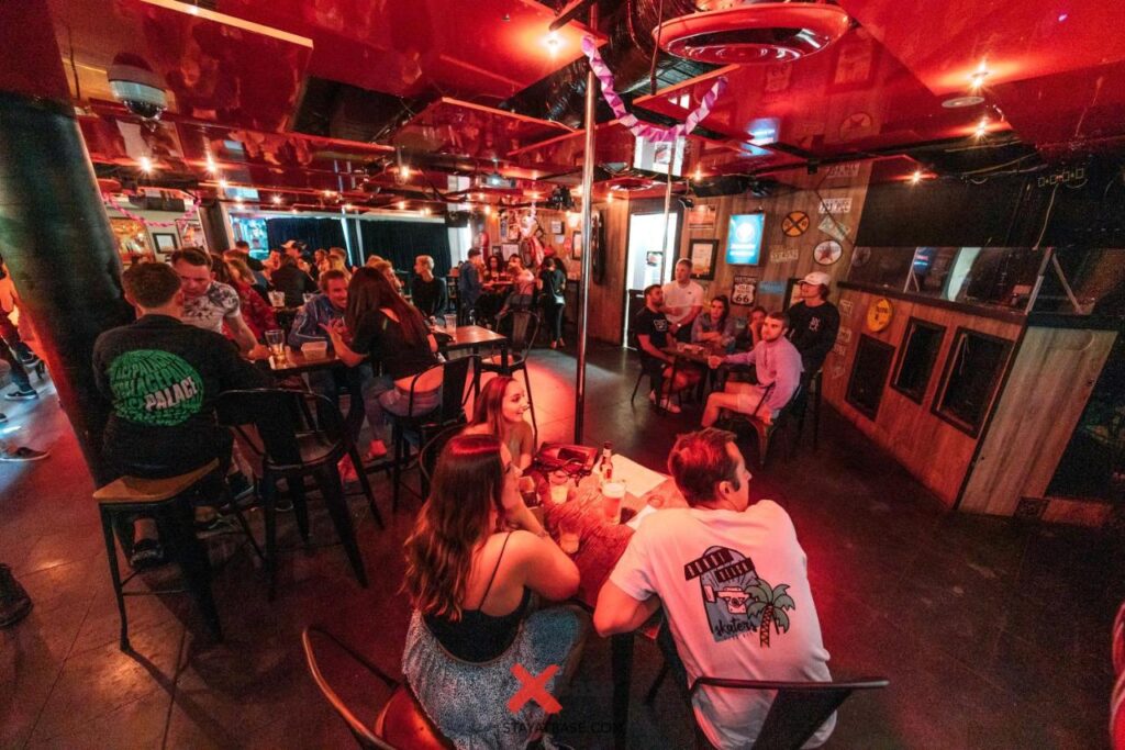 A bunch of travellers enjoying a live misic night at Nomads St Kilda