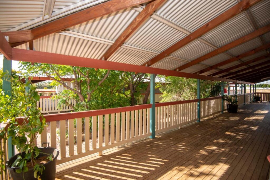 A surrounding verandah used for shade and sheter when it rains at Stork Rd Budget Rooms